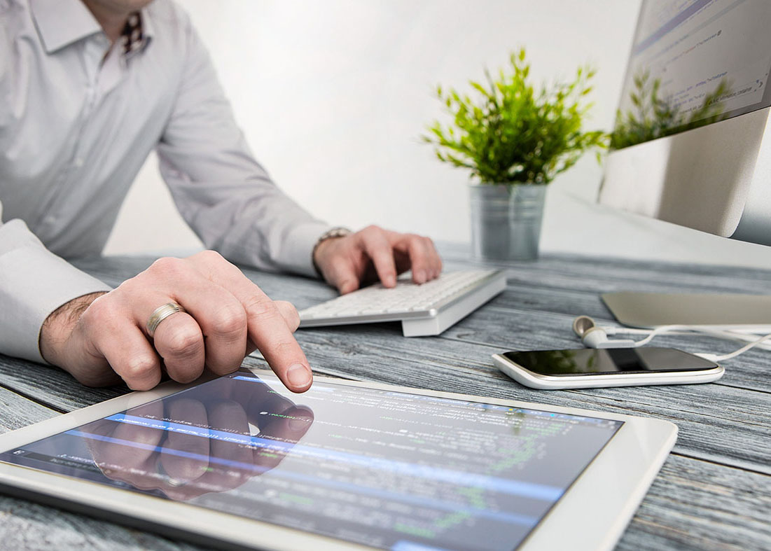 Web developer coding custom business website